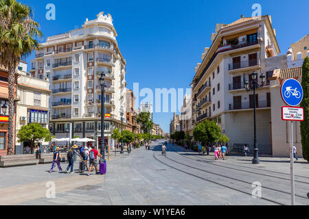 Avenida de la Constitucion in historic downtown centre of Seville, Andalusia, Spain, Europe Stock Photo
