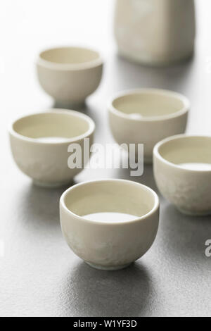 Traditional Japanese sake set, cups close up Stock Photo