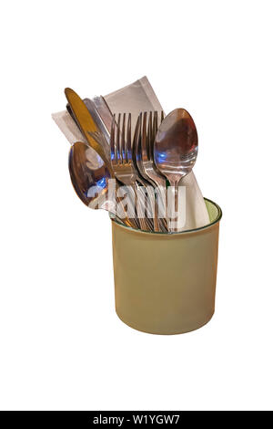 Isolated Spoon, fork and knife in a glass of zinc. on a white background with clipping path. Stock Photo