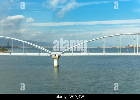 Lake Biwa and Omi Ohashi Bridge, view on the JR west local train Biwako Line Stock Photo