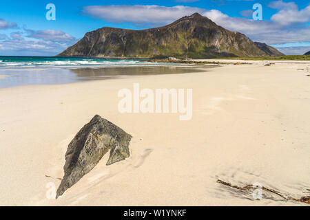 Flakstad Beach,Lofoten Islands, Norway on a beautiful spring day with golden sand and azure blue sea Stock Photo