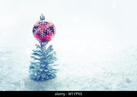 Christmas festival concepts ideas with ornament and silver pine cone and snow.top view Stock Photo