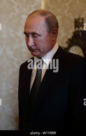 Pope shakes hands with ring-swiping Putin