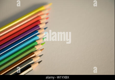 Color pencils isolated on white background, Color pencils form abstract lines pattern Stock Photo