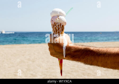 ice cream in the sun on the beach Stock Photo