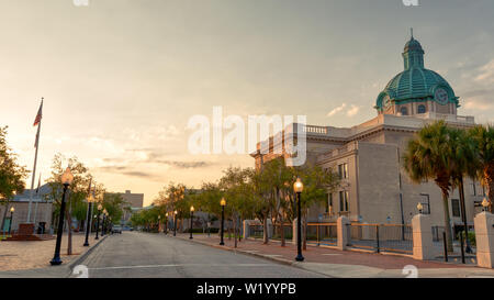 Historic DeLand Courthouse taken from the street at sunrise in small town of Deland Florida Stock Photo