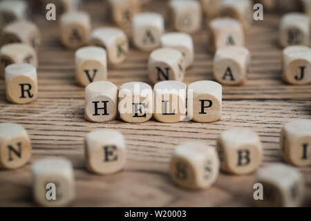 dice forming the word HELP Stock Photo