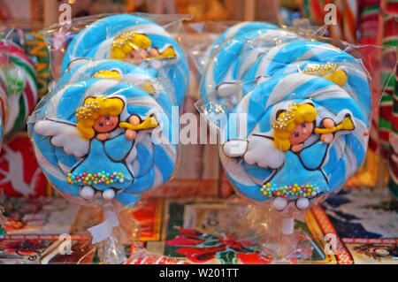 Christmas lollipops of different colors, flavors and shapes at the Christmas market Stock Photo