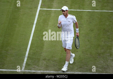 Andy Murray during his doubles match on day four of the Wimbledon Championships at the All England Lawn Tennis and Croquet Club, London. Stock Photo