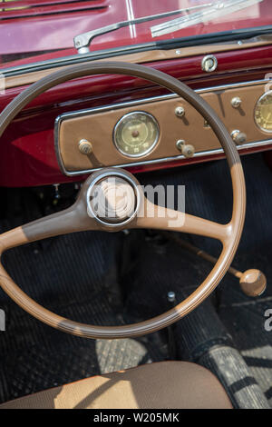 Steering wheel and dashboard of a vintage Fiat car Stock Photo