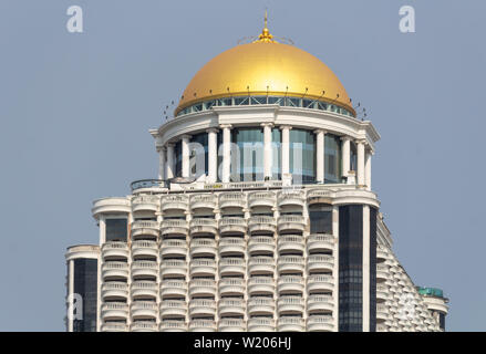 Bangkok, Thailand - April 14, 2019: State tower skyscraper with golden dome Stock Photo