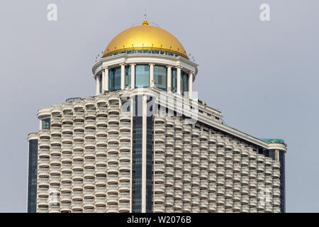 Bangkok, Thailand - April 14, 2019: State tower skyscraper with golden dome Stock Photo