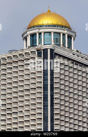 Bangkok, Thailand - April 14, 2019: State tower skyscraper with golden dome Stock Photo