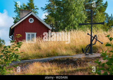 Anchor & Cross Memorial to Lost Sailors on archipelago of Finland Stock Photo