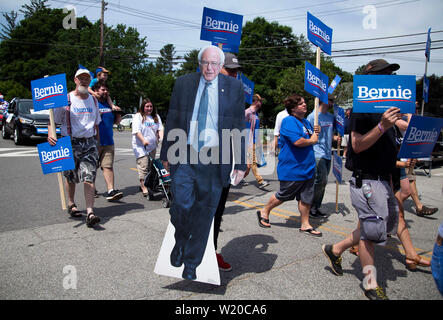 Amherst, NH, USA. 4th July, 2019. Presidential candidates marched in the 4th of July parade on July 4, 2019 in Amherst New Hampshire. They all were campaigning to voters for support. Bernie Sanders supporters marching in the parade. Credit: Allison Dinner/ZUMA Wire/Alamy Live News Stock Photo