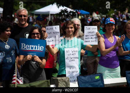 Amherst, NH, USA. 4th July, 2019. Presidential candidates marched in the 4th of July parade on July 4, 2019 in Amherst New Hampshire. They all were campaigning to voters for support. An anti Trump protestor. Credit: Allison Dinner/ZUMA Wire/Alamy Live News Stock Photo