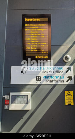 Margam, Wales, UK. 3rd July, 2019. A tv screen with a list of cancelled services at Port Talbot Parkway railway station in south Wales, UK. Wednesday 03 July 2019 Re: Two rail workers have died after being hit by a passenger train between Port Talbot Parkway and Bridgend stations in south Wales, UK. The pair were struck near Margam by the Swansea to London Paddington train at about 10am. They were pronounced dead at the scene and a third person was treated for shock, but was not injured. Credit: ATHENA PICTURE AGENCY LTD/Alamy Live News Stock Photo