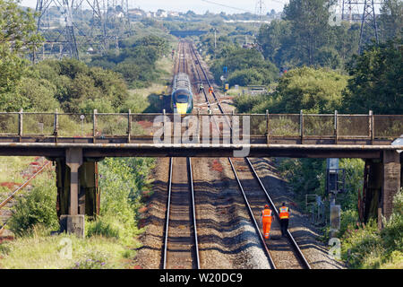 Margam, Wales, UK. 3rd July, 2019. The stranded train on the tracks near Margam in south Wales, UK. Wednesday 03 July 2019 Re: Two rail workers have died after being hit by a passenger train between Port Talbot Parkway and Bridgend stations in south Wales, UK. The pair were struck near Margam by the Swansea to London Paddington train at about 10am. They were pronounced dead at the scene and a third person was treated for shock, but was not injured. Credit: ATHENA PICTURE AGENCY LTD/Alamy Live News Stock Photo