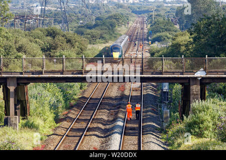 Margam, Wales, UK. 3rd July, 2019. The stranded train on the tracks near Margam in south Wales, UK. Wednesday 03 July 2019 Re: Two rail workers have died after being hit by a passenger train between Port Talbot Parkway and Bridgend stations in south Wales, UK. The pair were struck near Margam by the Swansea to London Paddington train at about 10am. They were pronounced dead at the scene and a third person was treated for shock, but was not injured. Credit: ATHENA PICTURE AGENCY LTD/Alamy Live News Stock Photo