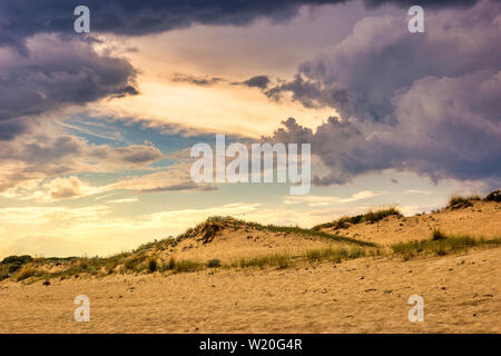 Dramatic cloudscape before storm on the beach. Majestic nature background. Stock Photo