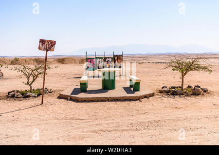 Concrete picnic table and benches, typically placed every 10-20kms along roads in Namibia Stock Photo