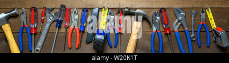 Working tools on wooden background Stock Photo
