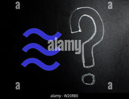 Question mark written by hand on a blackboard. Stock Photo