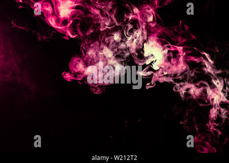 Colored background with winding clouds of smoke from patterns of different forms of pink, green and blue colors with tongues of flame on a black isola Stock Photo