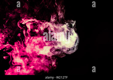 Colored background with winding clouds of smoke from patterns of different forms of pink, green and blue colors with tongues of flame on a black isola Stock Photo