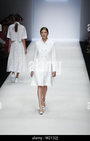 Berlin, Germany. 03rd July, 2019. The photo shows models on the catwalk with the collection spring/summer 2020 of the Designer RIANI at Mercedes-Benz Fashion Week. Credit: Simone Kuhlmey/Pacific Press/Alamy Live News Stock Photo