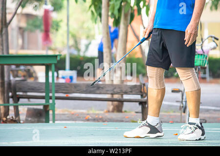 Sport equipment. Shuttlecock and badminton racket, skipping rope