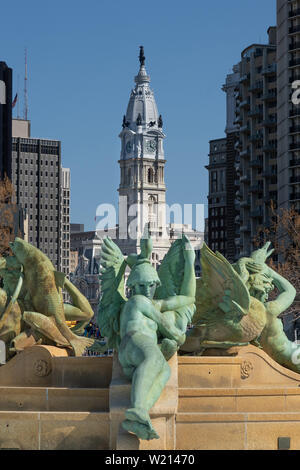 city hall in centr city Philadelphia seen in the background over the Swann Memorial Fountain in Logan Circle on the Benjamin Franklin Parkway; Stock Photo