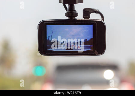 Picture cars and sky on camera in car. Stock Photo