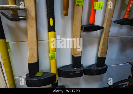 Chelyabinsk Region, Russia - JUNE 2019. Hardware store. Axes and hammers on sale