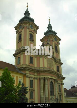 Minorite church in the middle of Eger, Hungary. The Dobo square in Eger. Travel outdoor european background Stock Photo