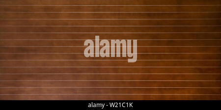 Brown panorama wood panel background texture with a pattern of parallel horizontal lines for a building material and interior decor Stock Photo