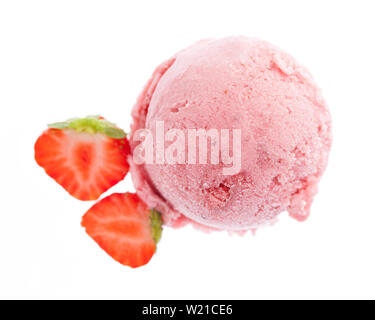 single strawberry ice cream scoop from above with two slices of strawberry isolated on white background Stock Photo