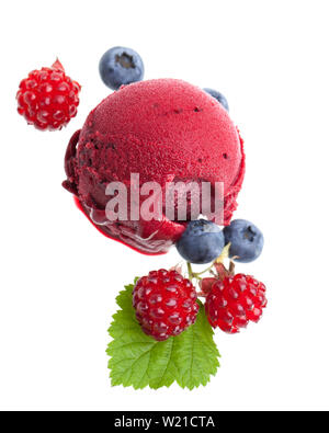 a single scoop of wild berry ice cream with berries isolated on white background Stock Photo