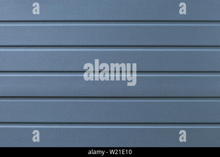 Blue metal texture background. Gray abstract lines pattern. Steel wall surface. Silver board, iron. Shiny grey element of a door. Grungy textured gara Stock Photo