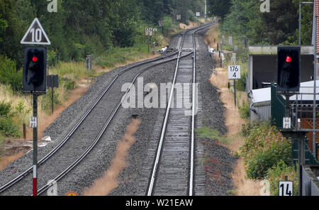 Bredstedt, Germany. 05th July, 2019. Empty tracks on the Marschbahn near Bredstedt. Due to a bridge being demolished after an accident and technical problems with trains, the so-called march line between Hamburg and Sylt is obstructed and trains are cancelled. Credit: Carsten Rehder/dpa/Alamy Live News Stock Photo