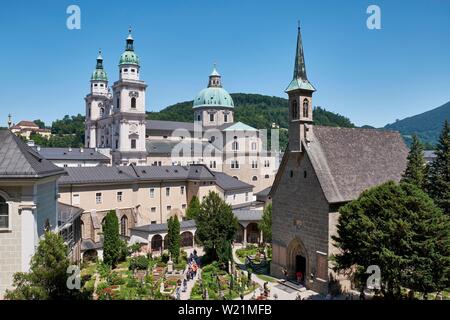 View over the St. Peter's Cemetery with Margarethenkapelle and Salzburg Cathedral, Salzburg, Austria Stock Photo