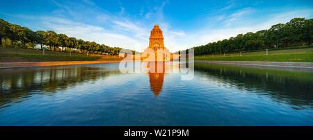 Monument to the Battle of Nations in the evening light, water reflection, Leipzig, Saxony, Germany Stock Photo