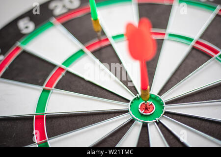 Dart hits Bullseye is a target and goal of business marketing as concept. Stock Photo