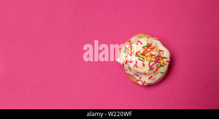 Creative flat composition food of sweet cake with multi-colored decoration Stock Photo