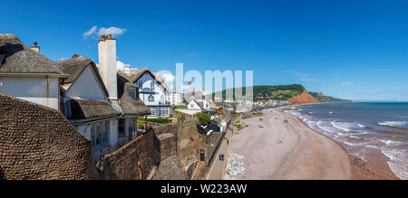 Panoramic view of seafront, beach and coastline of Sidmouth, a small popular south coast seaside town in Devon, south-west England