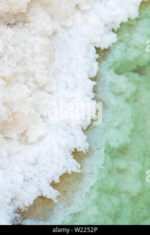 Close up view of salt crystals and mineral formation on the shore of Dead Sea in Israel Stock Photo