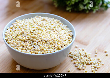 Raw Dry Organic Couscous in a Bowl. Turkish Kuskus Stock Photo