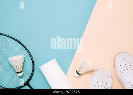 Different sports equipment on pastel color surface Stock Photo