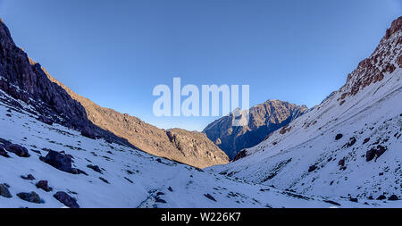 Panorama of Toubkal and other highest mountain peaks of High Atlas mountains in Toubkal national park, Morocco, North Africa Stock Photo