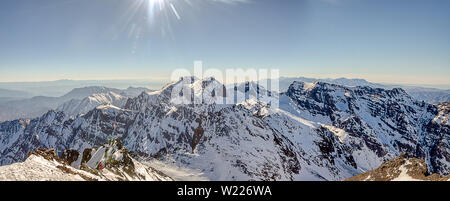 Panorama of Toubkal and other highest mountain peaks of High Atlas mountains in Toubkal national park, Morocco, North Africa Stock Photo